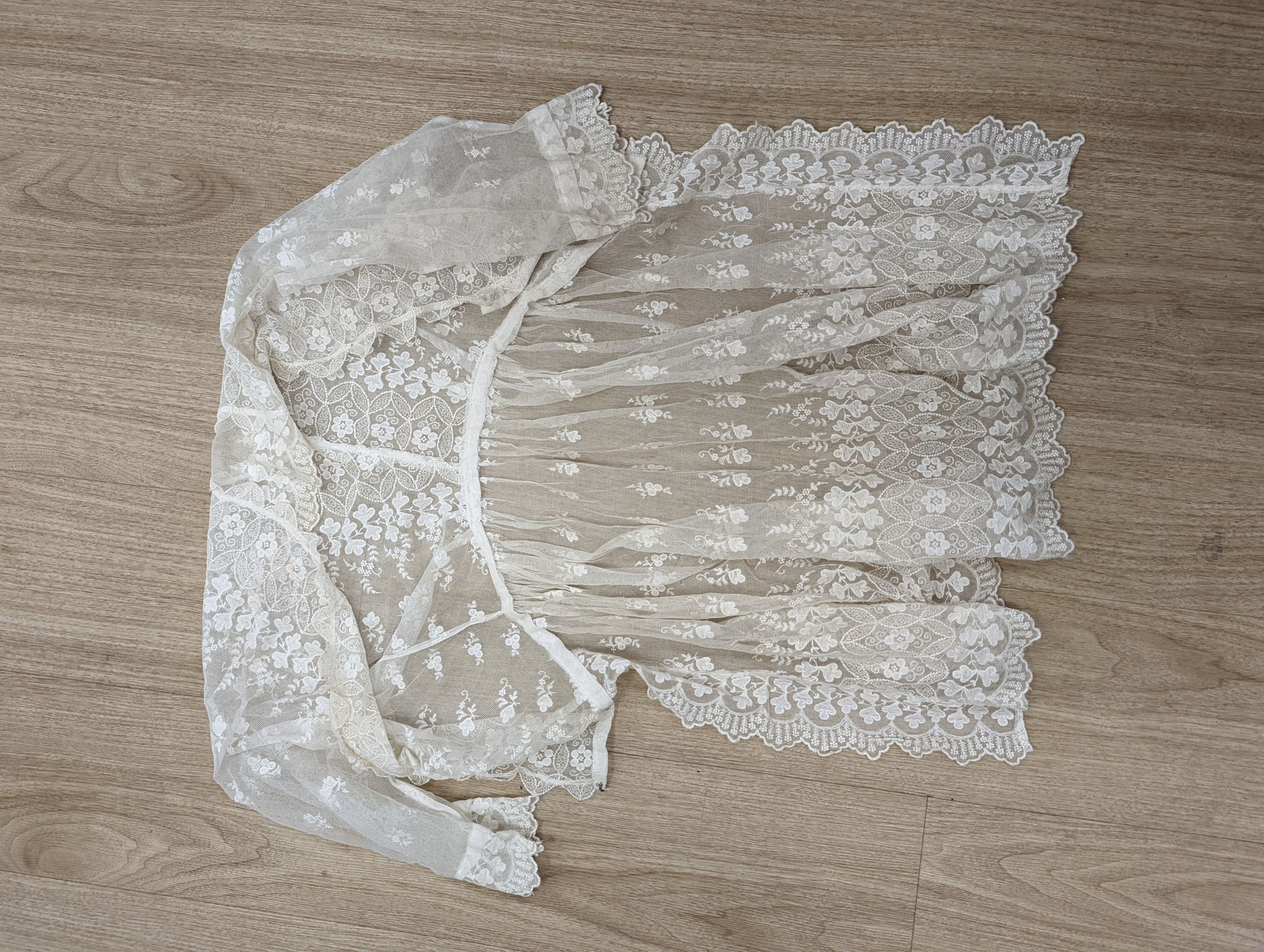 A lace jacket and five fine net and lace Edwardian ladies blouses.